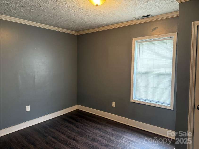 303 Southern Avenue, East Spencer, NC 28039.  MLS# CAR4264800, YatesRealty ID 15941. 