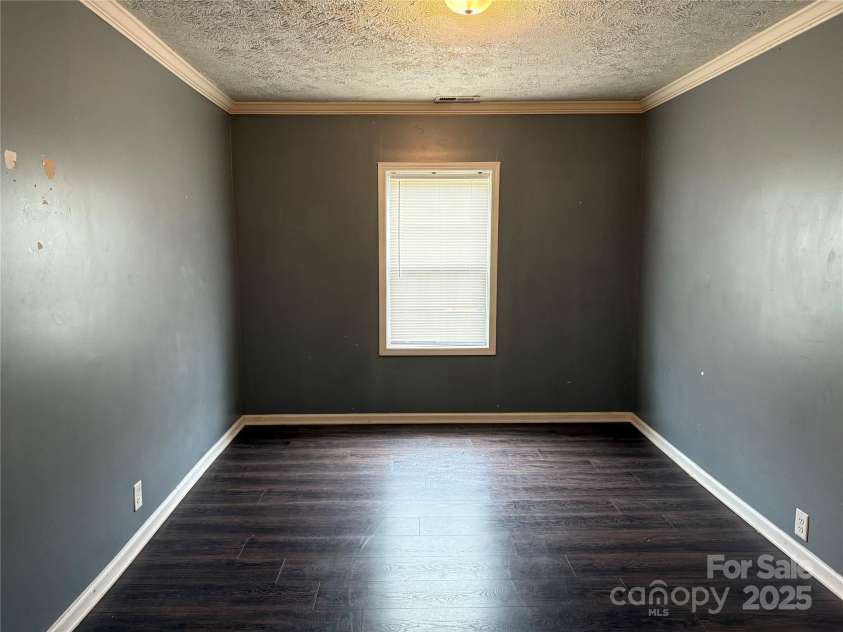 303 Southern Avenue, East Spencer, NC 28039.  MLS# CAR4264800, YatesRealty ID 15941. 