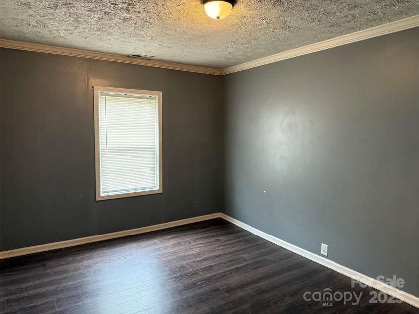 303 Southern Avenue, East Spencer, NC 28039.  MLS# CAR4264800, YatesRealty ID 15941. 