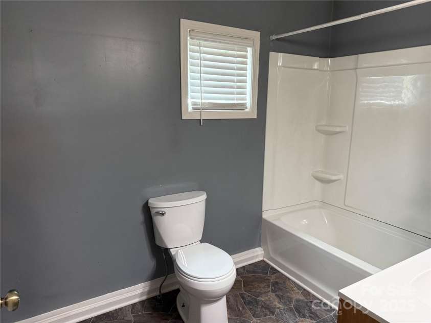 303 Southern Avenue, East Spencer, NC 28039.  MLS# CAR4264800, YatesRealty ID 15941. 