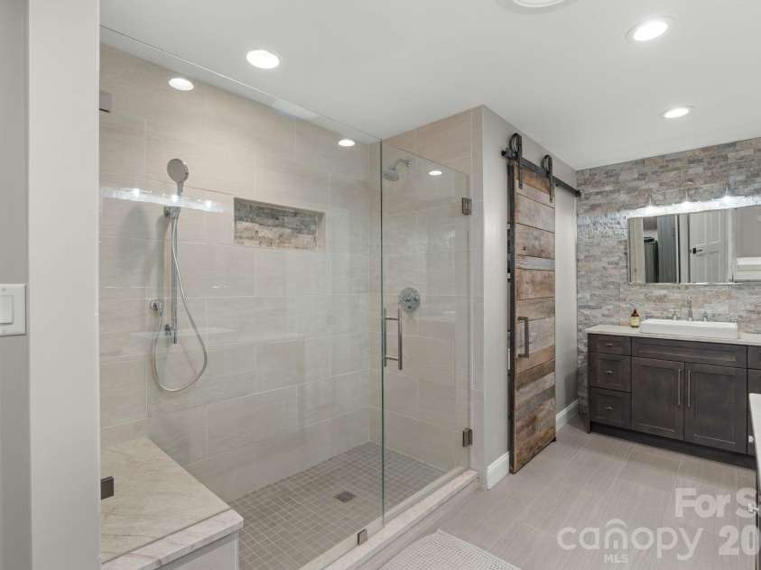 3302 Timber Trail, Asheville, NC 28804.  MLS# CAR4333678, YatesRealty ID 15948. Custom NC sourced wood barn door