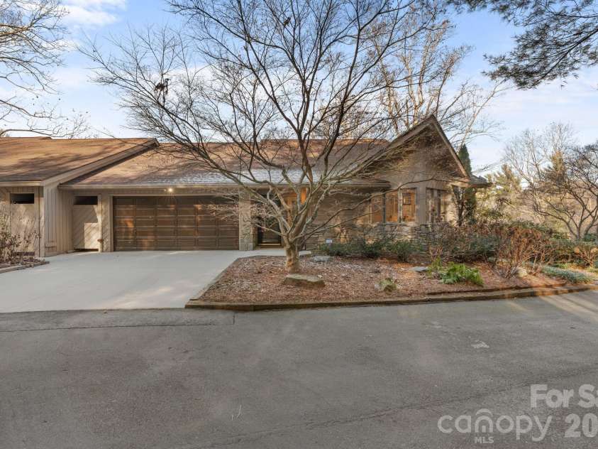 3302 Timber Trail, Asheville, NC 28804.  MLS# CAR4333678, YatesRealty ID 15948. Large two car garage.