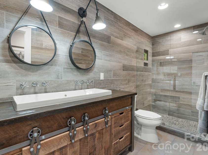 3302 Timber Trail, Asheville, NC 28804.  MLS# CAR4333678, YatesRealty ID 15948. Lower level bathroom