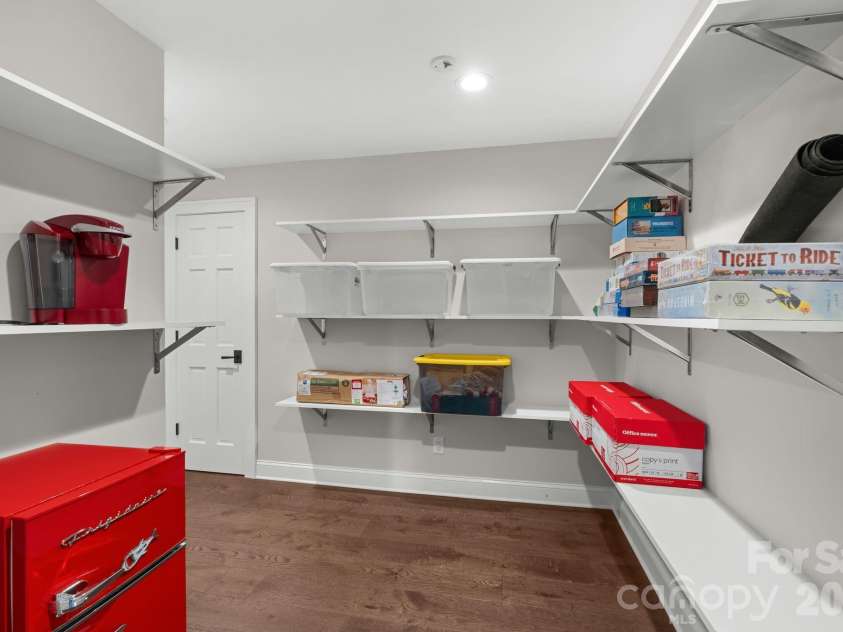 3302 Timber Trail, Asheville, NC 28804.  MLS# CAR4333678, YatesRealty ID 15948. Lower level storage area