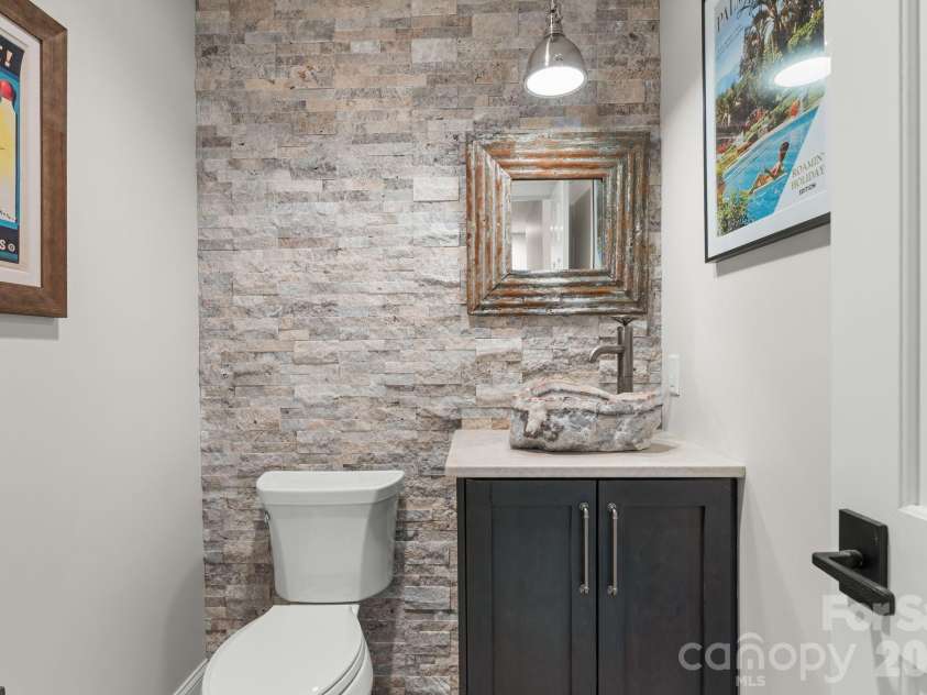 3302 Timber Trail, Asheville, NC 28804.  MLS# CAR4333678, YatesRealty ID 15948. Stunning custom rock sink basin
