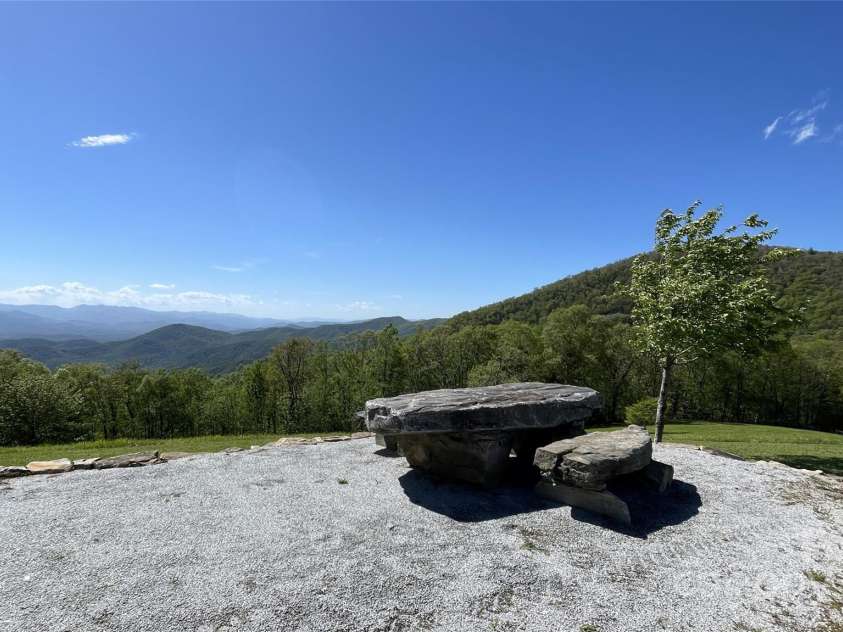 973 Sitting Rock Trail, Cullowhee, NC 28723.  MLS# CAR4257452, YatesRealty ID 15952. Massive Rock Picnic Table at the Mountain Lookout