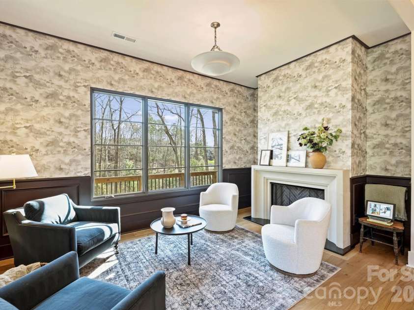1521 Reflection Pointe Boulevard, Belmont, NC 28012.  MLS# CAR4346556, YatesRealty ID 15956. Den with custom wallpaper overlooking rear yard