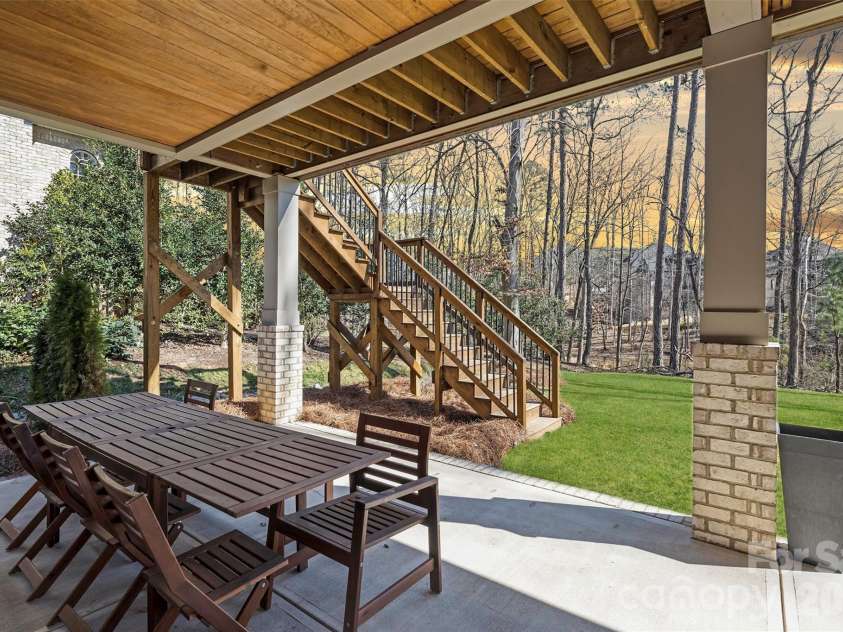 1521 Reflection Pointe Boulevard, Belmont, NC 28012.  MLS# CAR4346556, YatesRealty ID 15956. Lower Level Covered Porch