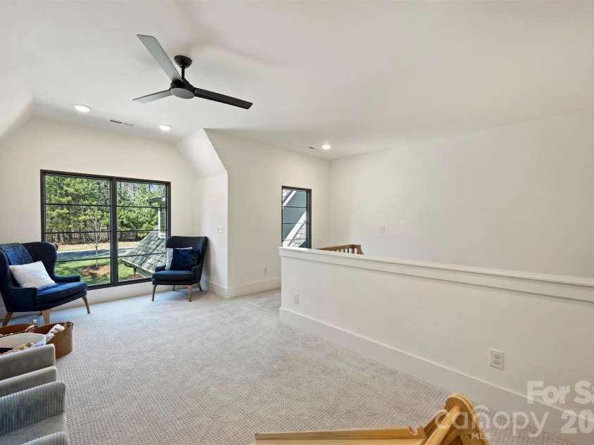 1521 Reflection Pointe Boulevard, Belmont, NC 28012.  MLS# CAR4346556, YatesRealty ID 15956. Upstairs Loft facing front