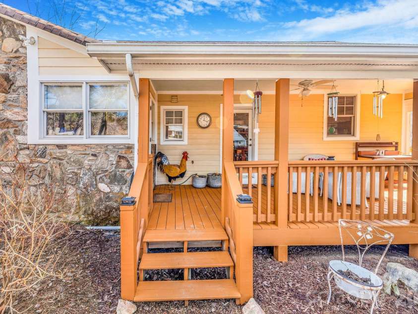 22 Mountain Spring Lane, Canton, NC 28716.  MLS# CAR4346093, YatesRealty ID 15957. Covered side porch