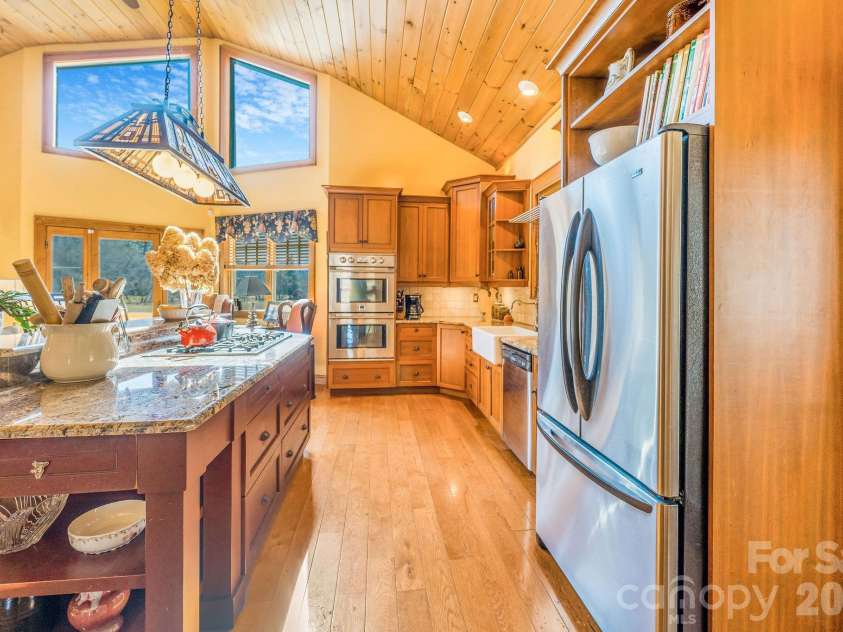 22 Mountain Spring Lane, Canton, NC 28716.  MLS# CAR4346093, YatesRealty ID 15957. Home conveys with refrigerator, dishwasher, wall over, gas range, microwave, and disposal