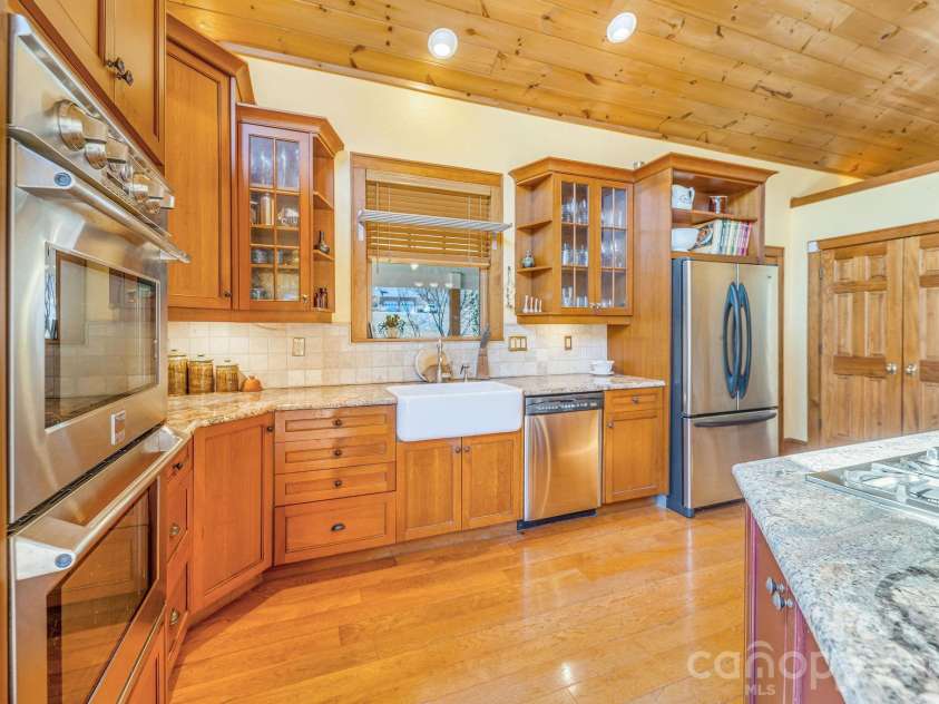 22 Mountain Spring Lane, Canton, NC 28716.  MLS# CAR4346093, YatesRealty ID 15957. Kitchen with dedicated pantry