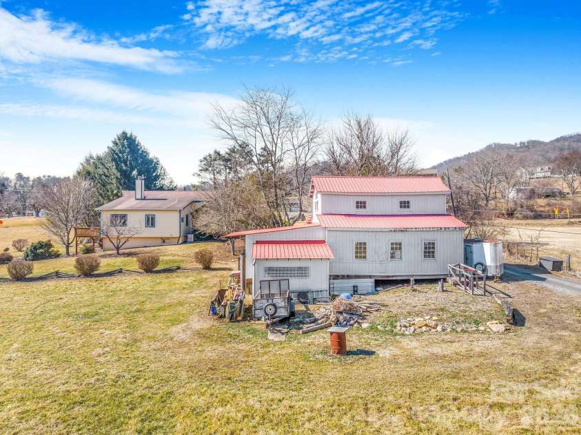 22 Mountain Spring Lane, Canton, NC 28716.  MLS# CAR4346093, YatesRealty ID 15957. Spacious barn is perfect for a workshop or storage space or can be used for farm operations again.