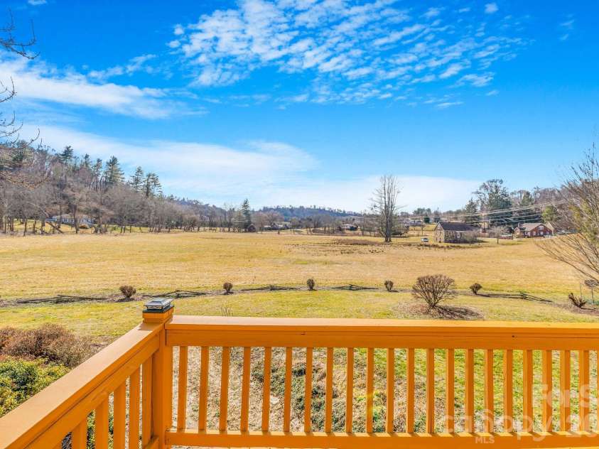 22 Mountain Spring Lane, Canton, NC 28716.  MLS# CAR4346093, YatesRealty ID 15957. Views from the front deck