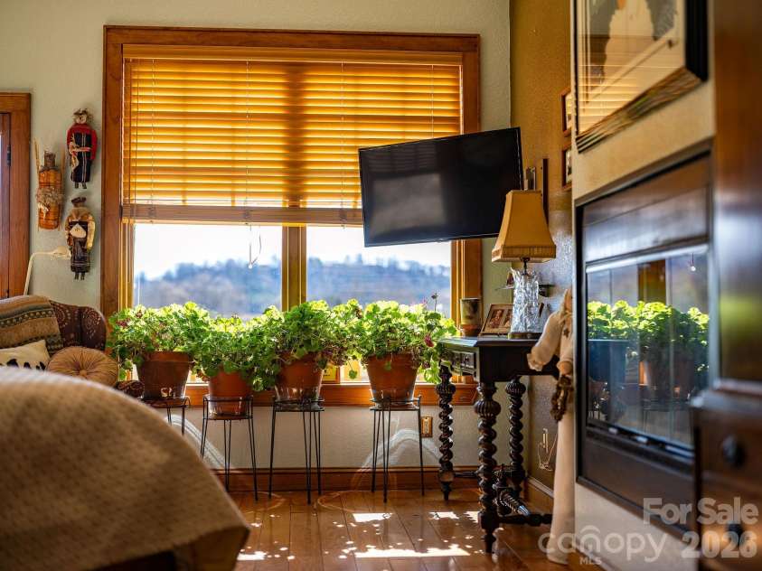 22 Mountain Spring Lane, Canton, NC 28716.  MLS# CAR4346093, YatesRealty ID 15957. Warm with the fireplace or warm with the sun