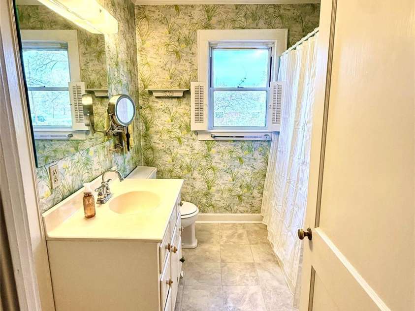 1005 Main Street, Oakboro, NC 28129.  MLS# CAR4357872, YatesRealty ID 15965. Downstairs main bathroom