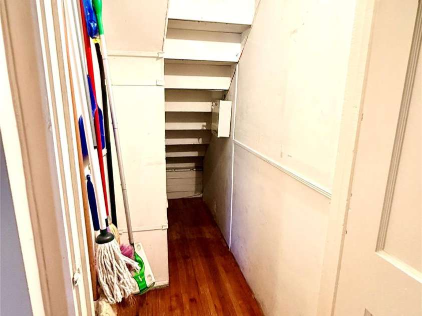 1005 Main Street, Oakboro, NC 28129.  MLS# CAR4357872, YatesRealty ID 15965. Downstairs storage/broom closet
