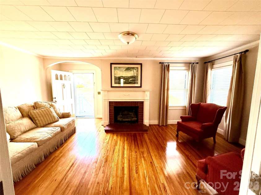 1005 Main Street, Oakboro, NC 28129.  MLS# CAR4357872, YatesRealty ID 15965. Formal Living Room w/ fireplace