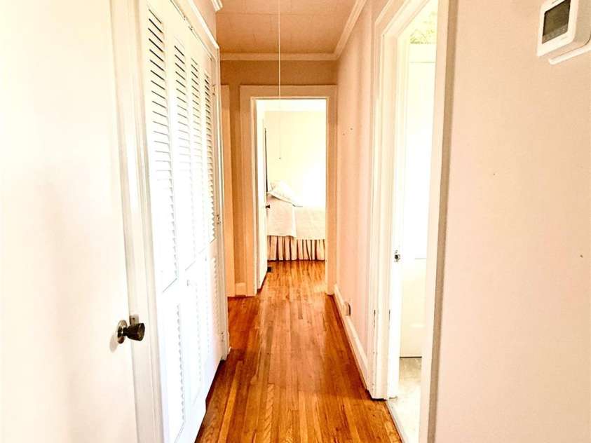 1005 Main Street, Oakboro, NC 28129.  MLS# CAR4357872, YatesRealty ID 15965. Hallway from bedroom 2 to master
