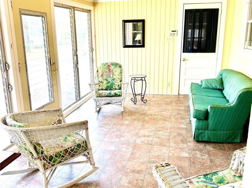 1005 Main Street, Oakboro, NC 28129.  MLS# CAR4357872, YatesRealty ID 15965. Year round sunroom