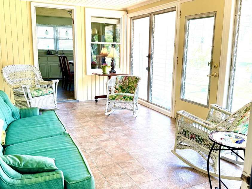 1005 Main Street, Oakboro, NC 28129.  MLS# CAR4357872, YatesRealty ID 15965. Year round sunroom