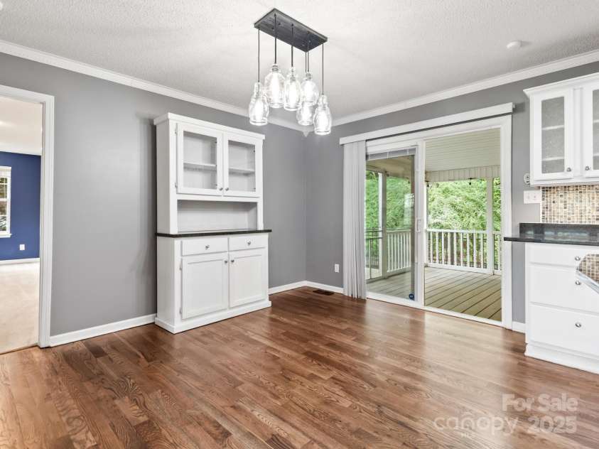 106 Thistle Tree Way, Weaverville, NC 28787.  MLS# CAR4248602, YatesRealty ID 15965. Access to Screen Porch Off Kitchen