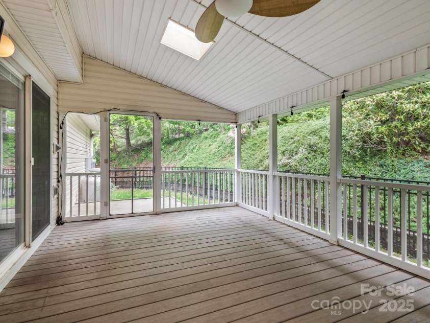 106 Thistle Tree Way, Weaverville, NC 28787.  MLS# CAR4248602, YatesRealty ID 15965. Screen Porch Off Kitchen