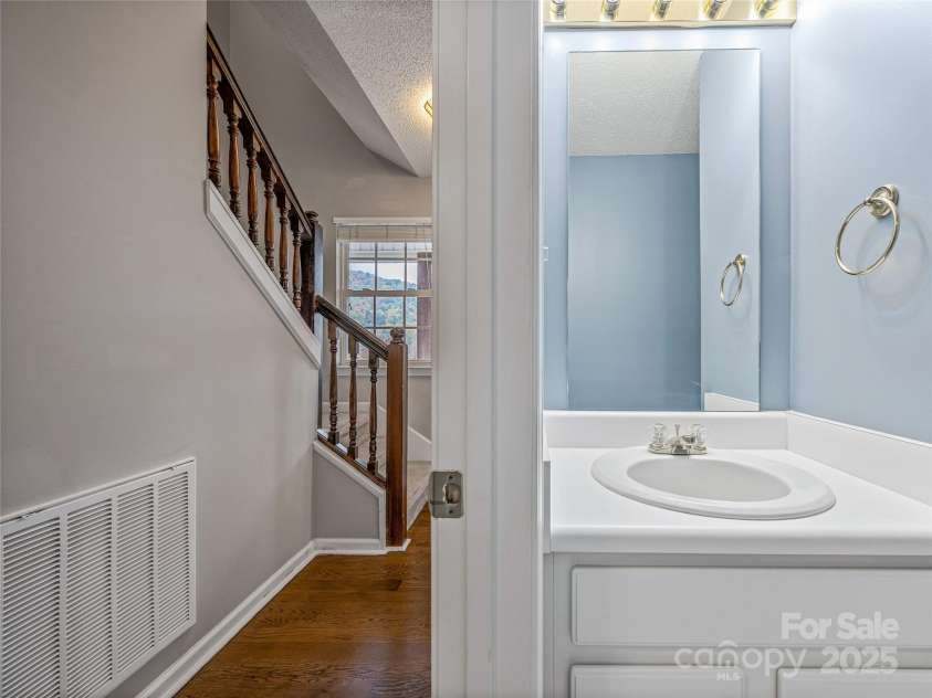 106 Thistle Tree Way, Weaverville, NC 28787.  MLS# CAR4315320, YatesRealty ID 15965. Powder room on Main Level of home