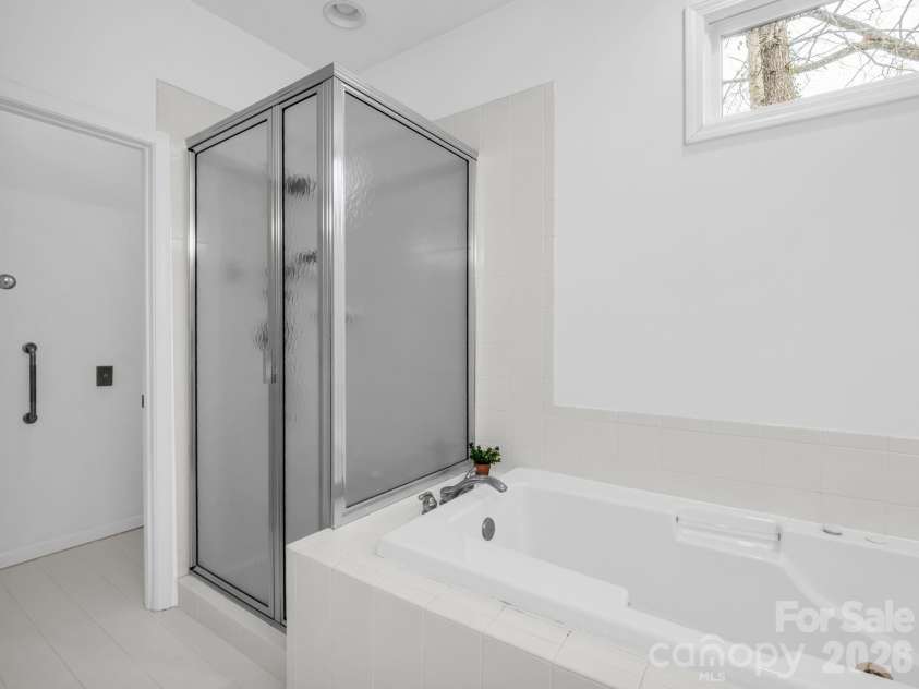 5 Hearthstone Lane, Flat Rock, NC 28731.  MLS# CAR4358961, YatesRealty ID 15969. Primary Bathroom