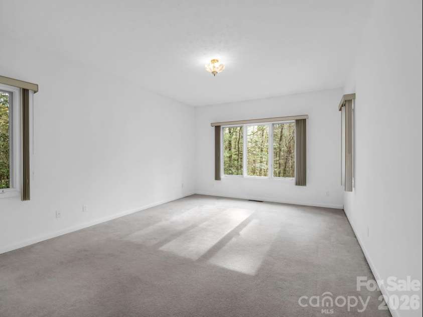 5 Hearthstone Lane, Flat Rock, NC 28731.  MLS# CAR4358961, YatesRealty ID 15969. Primary Bedroom 