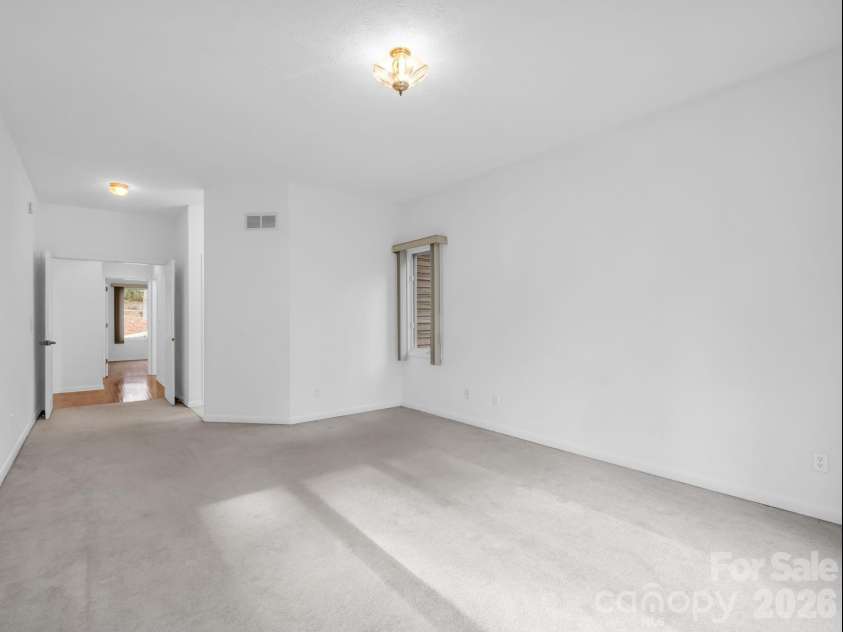 5 Hearthstone Lane, Flat Rock, NC 28731.  MLS# CAR4358961, YatesRealty ID 15969. Primary Bedroom 