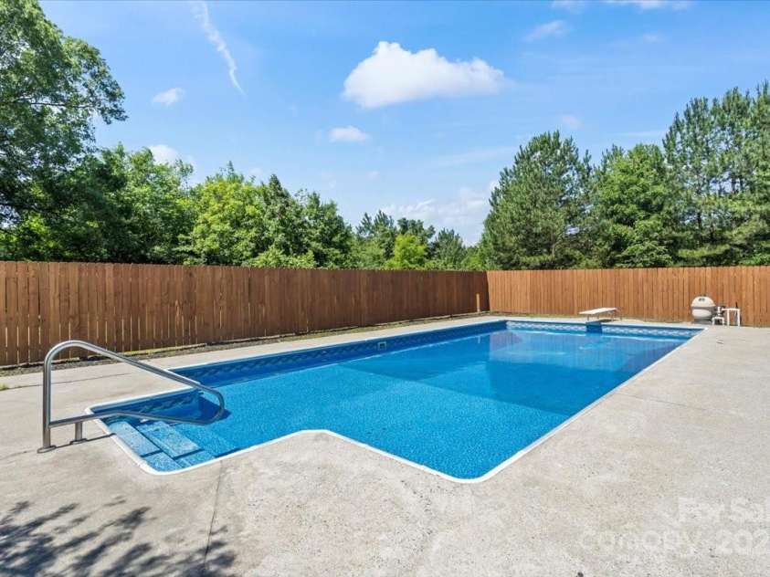 1015 4th Street, Spencer, NC 28159.  MLS# CAR4259927, YatesRealty ID 15977. Pool