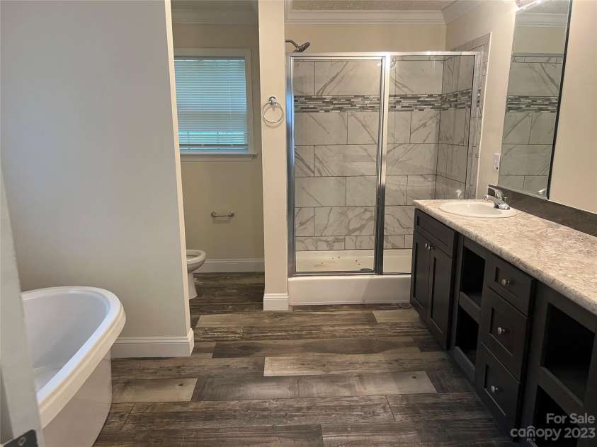 5716 Dalmatian Street, Iron Station, NC 28080.  MLS# CAR4024125, YatesRealty ID 1598. Primary Bath