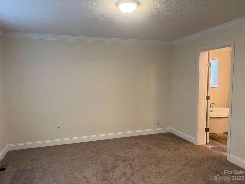 5716 Dalmatian Street, Iron Station, NC 28080.  MLS# CAR4024125, YatesRealty ID 1598. Primary Bedroom