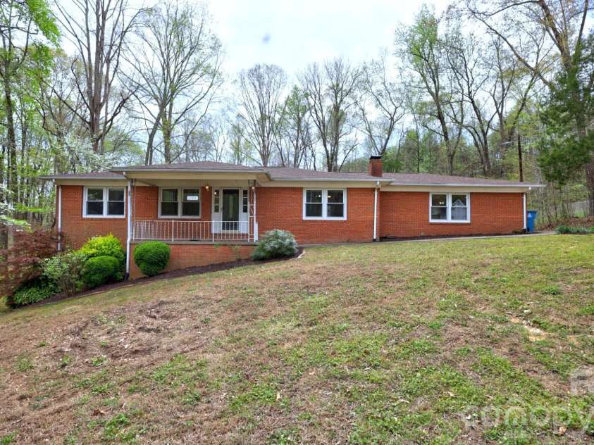 1130 Allman Extension, Mount Pleasant, NC 28124.  MLS# CAR4365087, YatesRealty ID 15982. Charming full brick ranch on large private lot.