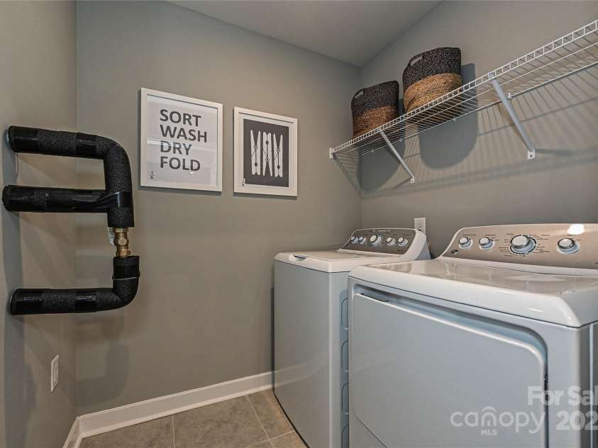 124 Kristin View Lane, Troutman, NC 28166.  MLS# CAR4269391, YatesRealty ID 15983. 1st Floor Laundry includes Washer & Dryer
