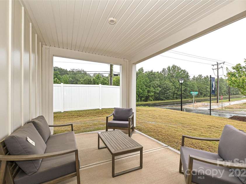 124 Kristin View Lane, Troutman, NC 28166.  MLS# CAR4269391, YatesRealty ID 15983. Covered Back Porch