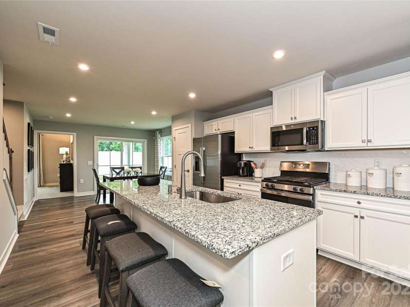 124 Kristin View Lane, Troutman, NC 28166.  MLS# CAR4269391, YatesRealty ID 15983. Expansive Island with Breakfast BAr