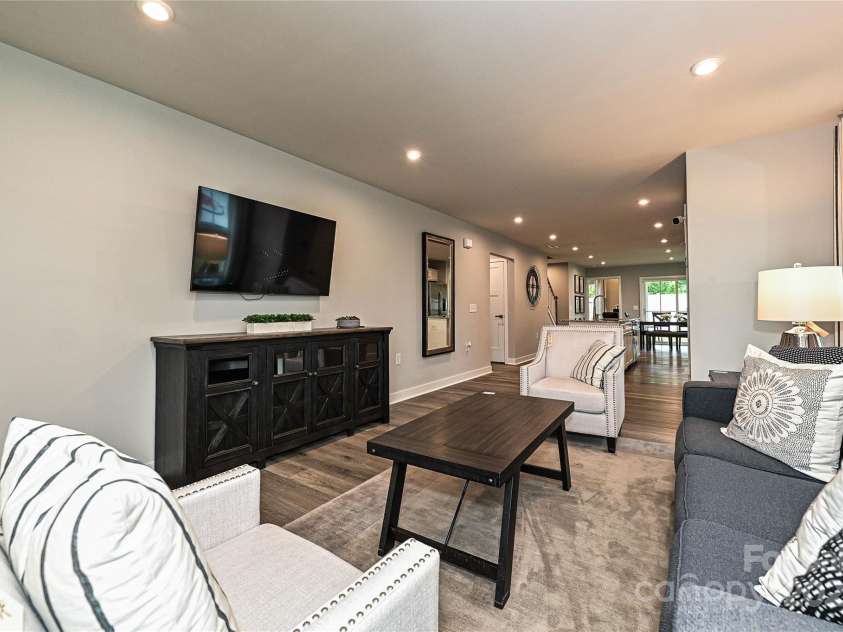 124 Kristin View Lane, Troutman, NC 28166.  MLS# CAR4269391, YatesRealty ID 15983. Great Room is surrounded in natural light