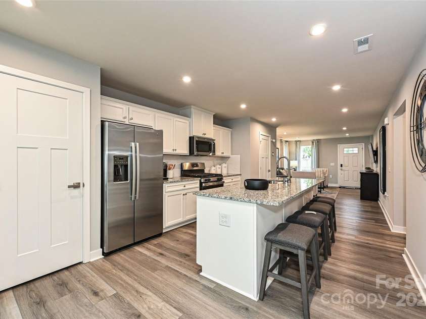 124 Kristin View Lane, Troutman, NC 28166.  MLS# CAR4269391, YatesRealty ID 15983. Pantry for additional storage