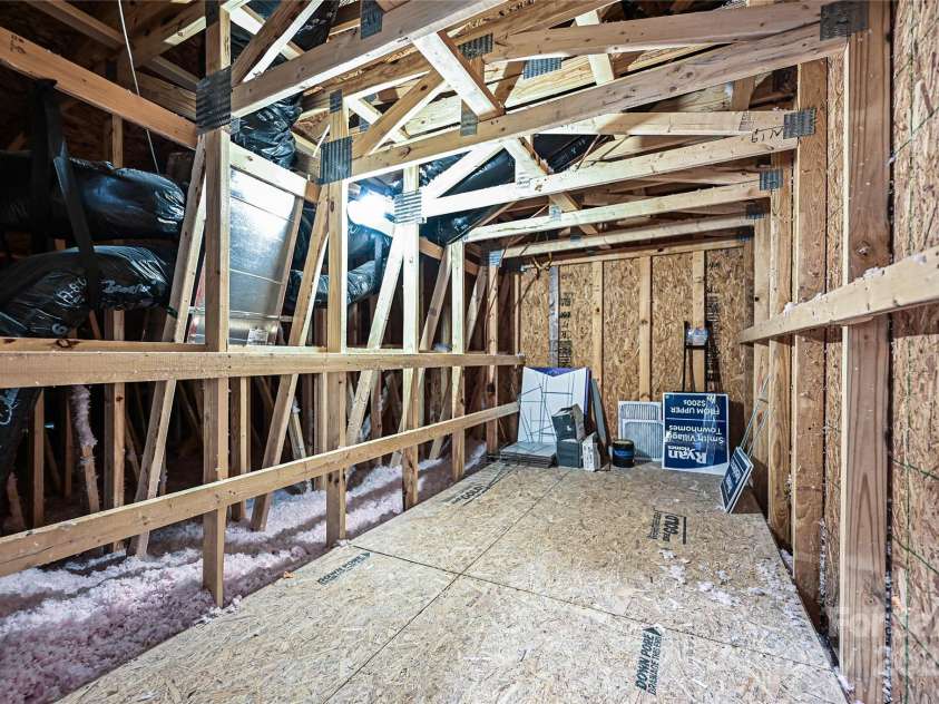 124 Kristin View Lane, Troutman, NC 28166.  MLS# CAR4269391, YatesRealty ID 15983. Walk-in Attic Storage