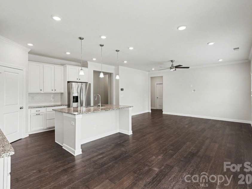 2156 Poplar Ridge Drive, Monroe, NC 28110.  MLS# CAR4365598, YatesRealty ID 15983. Kitchen And Living Room