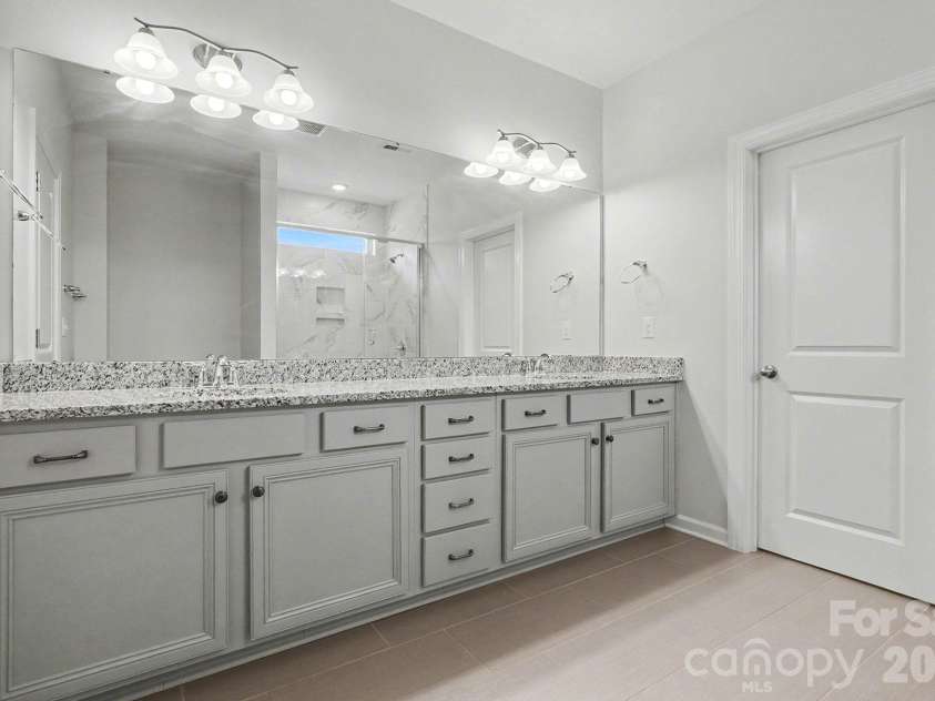 2156 Poplar Ridge Drive, Monroe, NC 28110.  MLS# CAR4365598, YatesRealty ID 15983. Master Bath Vanity