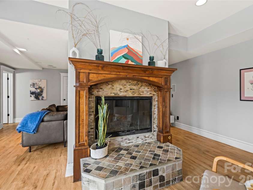 430 Parkway North Road, Mill Spring, NC 28756.  MLS# CAR4365350, YatesRealty ID 15984. Basement fireplace