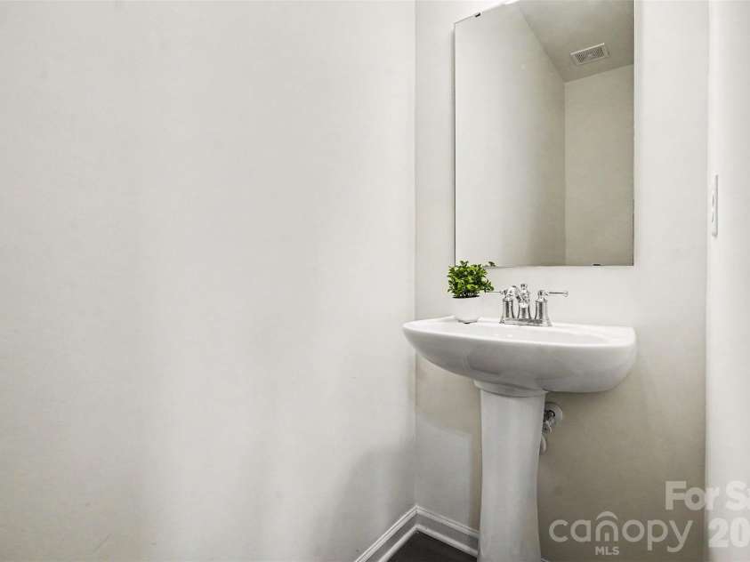 1565 Banham Drive, Indian Trail, NC 28079.  MLS# CAR4391061, YatesRealty ID 15985. First Floor Half Bath