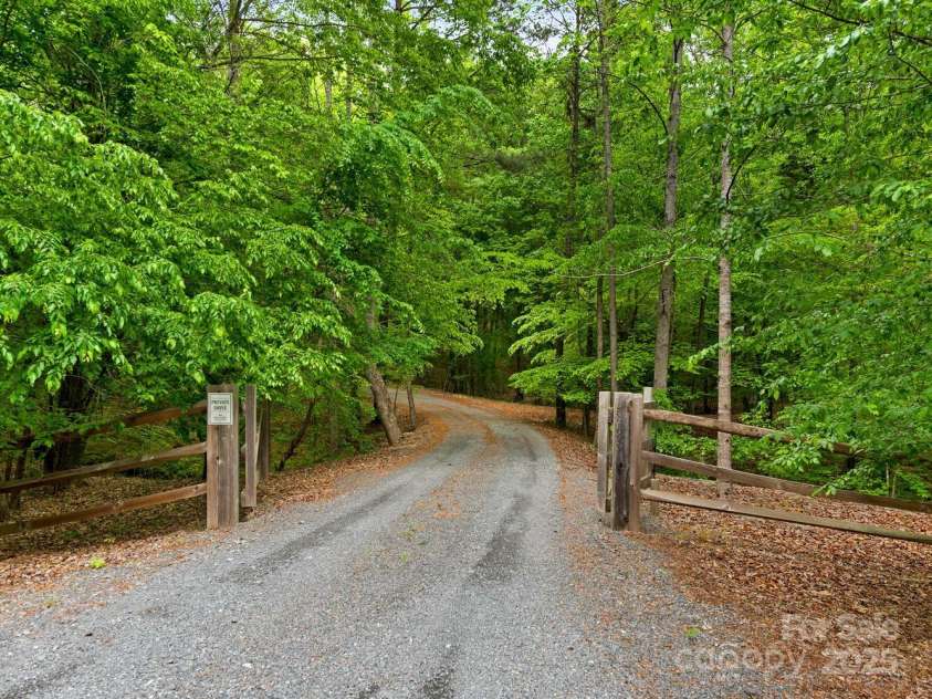 3385 Rainbow Drive, Marvin, NC 28173.  MLS# CAR4251515, YatesRealty ID 15986. Driveway entrance from Rainbow Dr cul de sac.