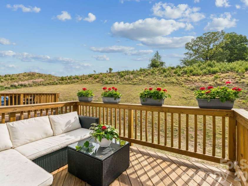 2050 Dornoch Road, Tega Cay, SC 29708.  MLS# CAR4367235, YatesRealty ID 15987. Back deck