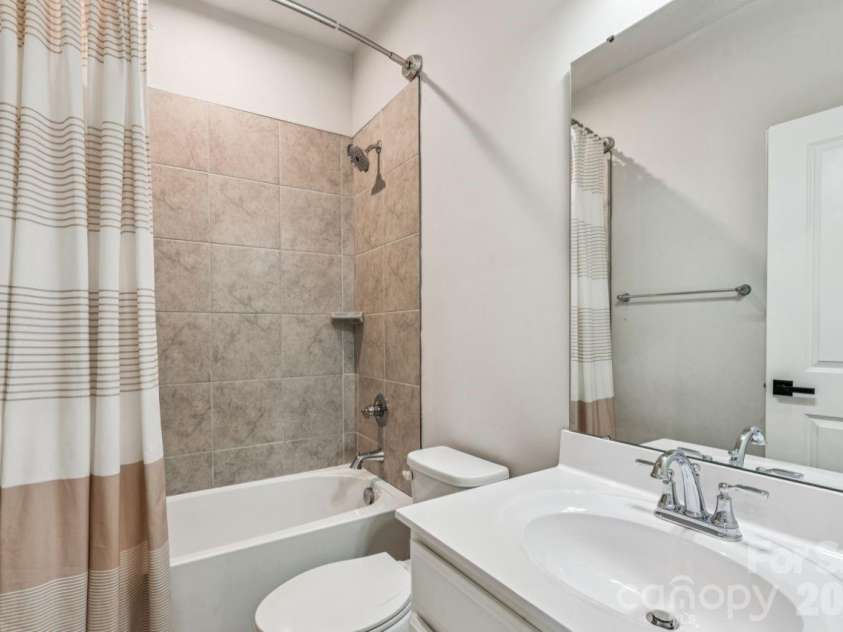 2050 Dornoch Road, Tega Cay, SC 29708.  MLS# CAR4367235, YatesRealty ID 15987. Hallway Bathroom