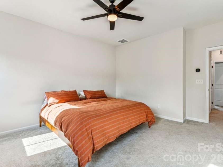 2050 Dornoch Road, Tega Cay, SC 29708.  MLS# CAR4367235, YatesRealty ID 15987. Primary Bedroom Suite