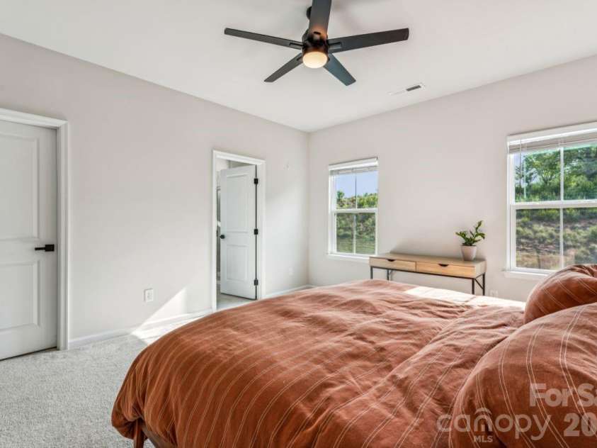 2050 Dornoch Road, Tega Cay, SC 29708.  MLS# CAR4367235, YatesRealty ID 15987. Primary Walk In Closet & Bath